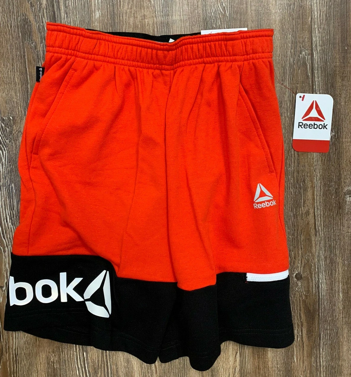 Pantaloncini corti classici Reebok taglia 8 nuovi da ragazzo rossi riflettenti