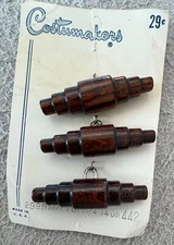 vintage wooden toggle buttons on original card Costumakers Art Deco style 1 3/4"