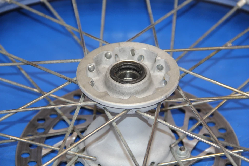 96-07 CRF250R CR250R CR125R 2005 llanta delantera radios centrales buje husillo rotor Foto 2 de 4