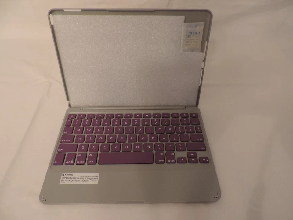 Funda tipo folio ZAGG, con bisagras con teclado Bluetooth para tablet retroiluminada para iPad Air 2 Foto 4 de 4