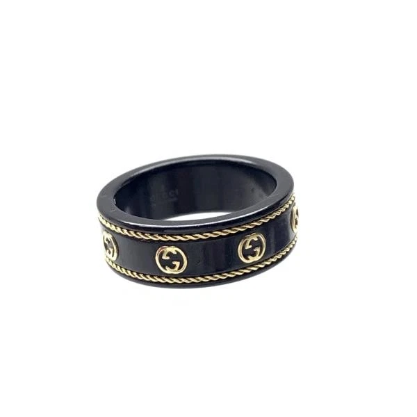 Bague Gucci Icon imbriquée G or jaune 18 carats noire US6,5 bijoux femme