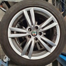 4 cerchi 17 pollici in lega ALFA ROMEO  originali(usati) c/gomme 225/50 +stemma