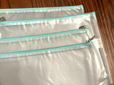 Accessory bags with a zipper, plastic transparent, new, a set of 4 11.5 x 9