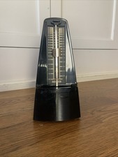 Mechanical Hosayin metronome used by musician to track tempo in beats per minute
