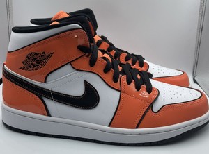 orange and black patent leather ones
