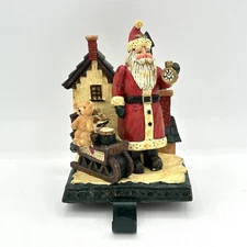 Holiday Home Christmas Stocking Hanger Santa Holding Clock With Sleigh Toys Bear