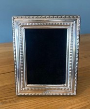 Sterling silver Photograph Frame. Hallmarked in London with velvet back.