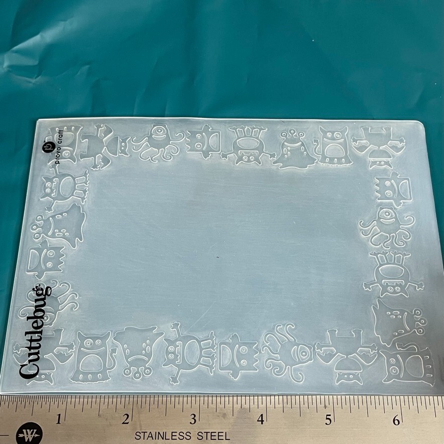 Provo Craft Cuttlebug Monsters Aliens Frame Background Embossing Folder A2