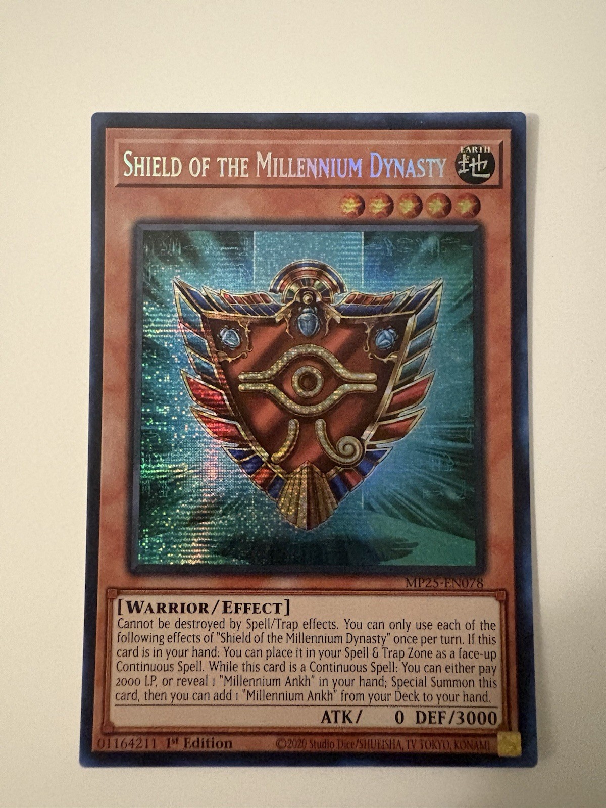 Shield of the Millennium Dynasty MP25-EN078 YuGiOh 2025 Mega Pack Tin trading card — raw and PSA graded price guide