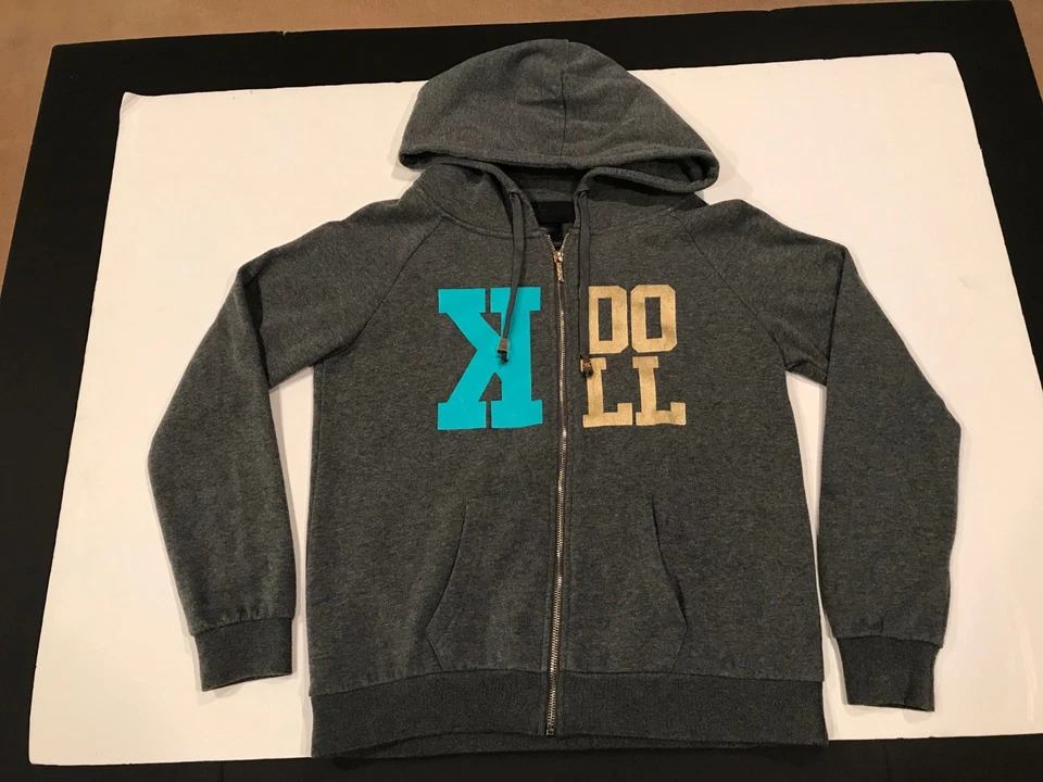 Chaqueta sudadera mediana Kim Kardashian Kollection para mujer con capucha y cremallera Foto 3 de 4