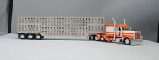 DCP 1/64 Dry Creek Orange White Tri-Axle Peterbilt 389 Wilson Livestock 60-1051