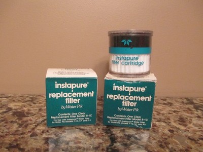 (2) Teledyne Water Pik Instapure Model R-1C Replacement Water Filters - 1 Open