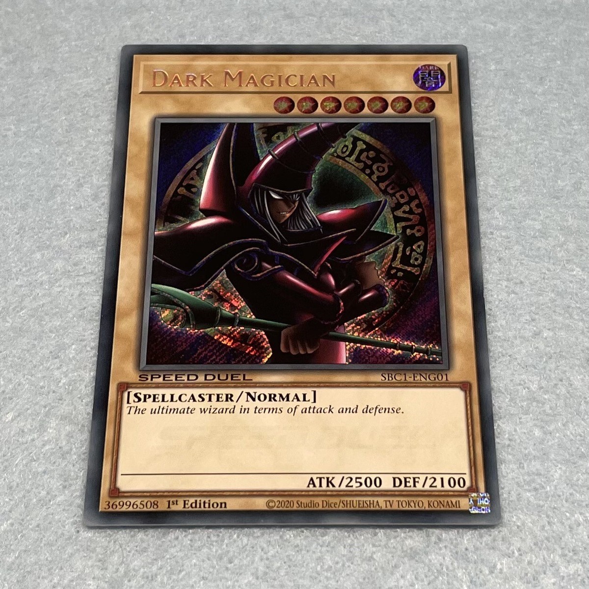 Yugioh Arkana Dark Magician SBC1 1st Ed Secret Rare Alternate Red