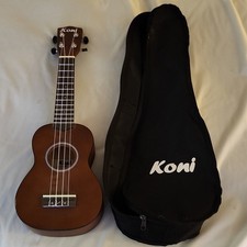 4-String Koni Soprano Ukulele Brown Beginner Acoustic Ukulele w/case.