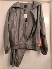 Vintage Outbrook women  s windbreaker Track suit Size Medium Silver NEW with Tags