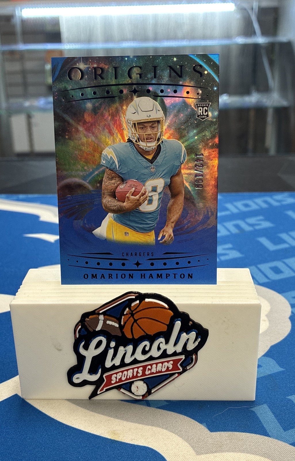 2025 Panini Origins Rookies Omarion Hampton, Omarion Hampton #134 Holo Blue /199
