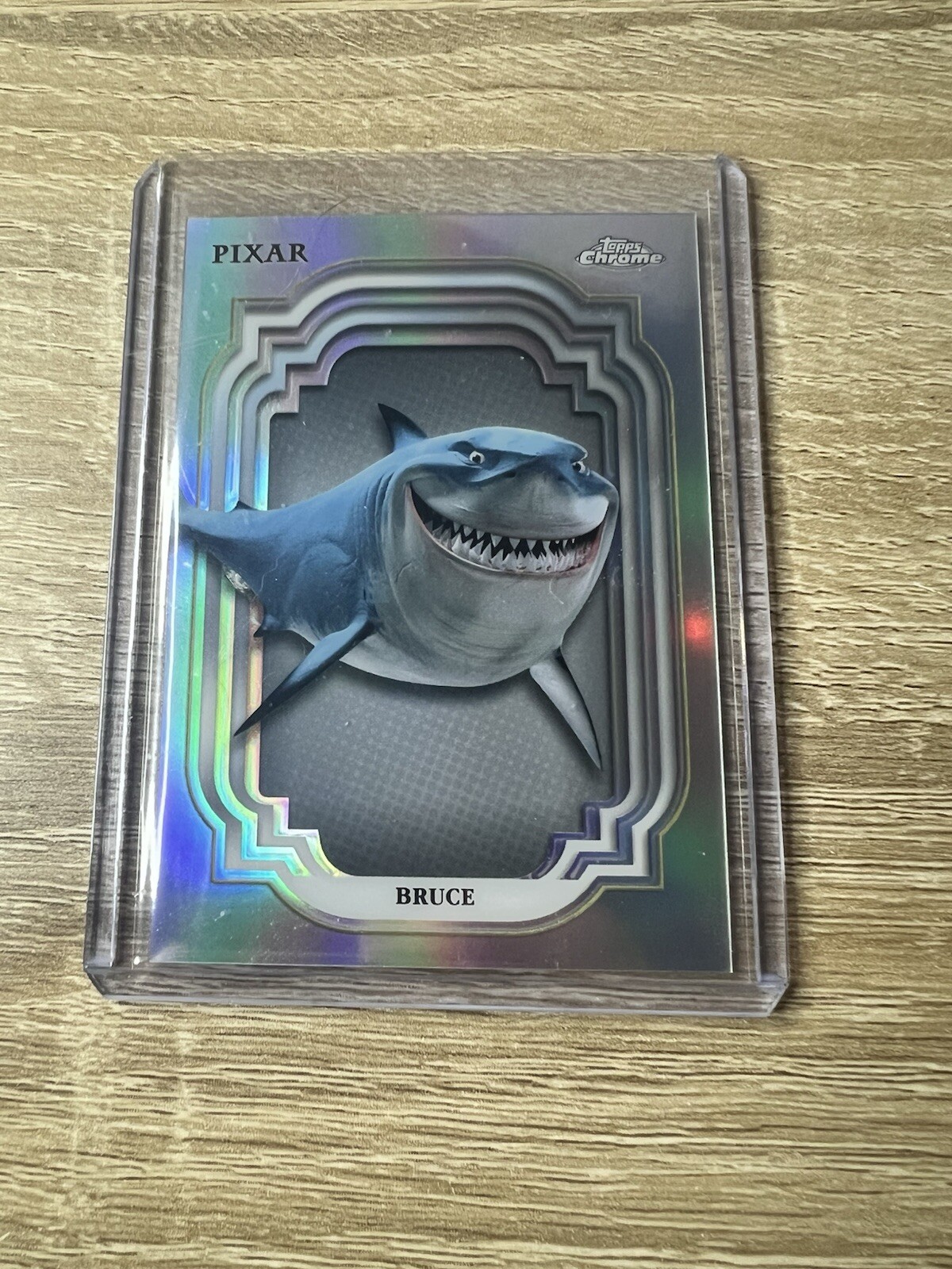 2024 Topps Chrome Disney Pixar #111 Bruce Refractor