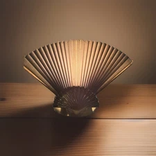 Vintage brass shell base pleated fan decorative object.