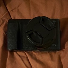 Black Compact Digital Camera with LCD Screen and Digital Zoom Lens