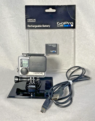 GoPro HERO4 Action Camera w/ Waterproof Case, 2 Batteries 1 New, & Charging Cord