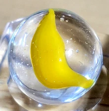 MOST ACCURATE REPRESENTATION OF A BANANA = PELTIER CATS-EYE NM+/-  .635" 6B/75