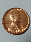 1957-D Lincoln Wheat Penny OCS.Leaning L on the rim.