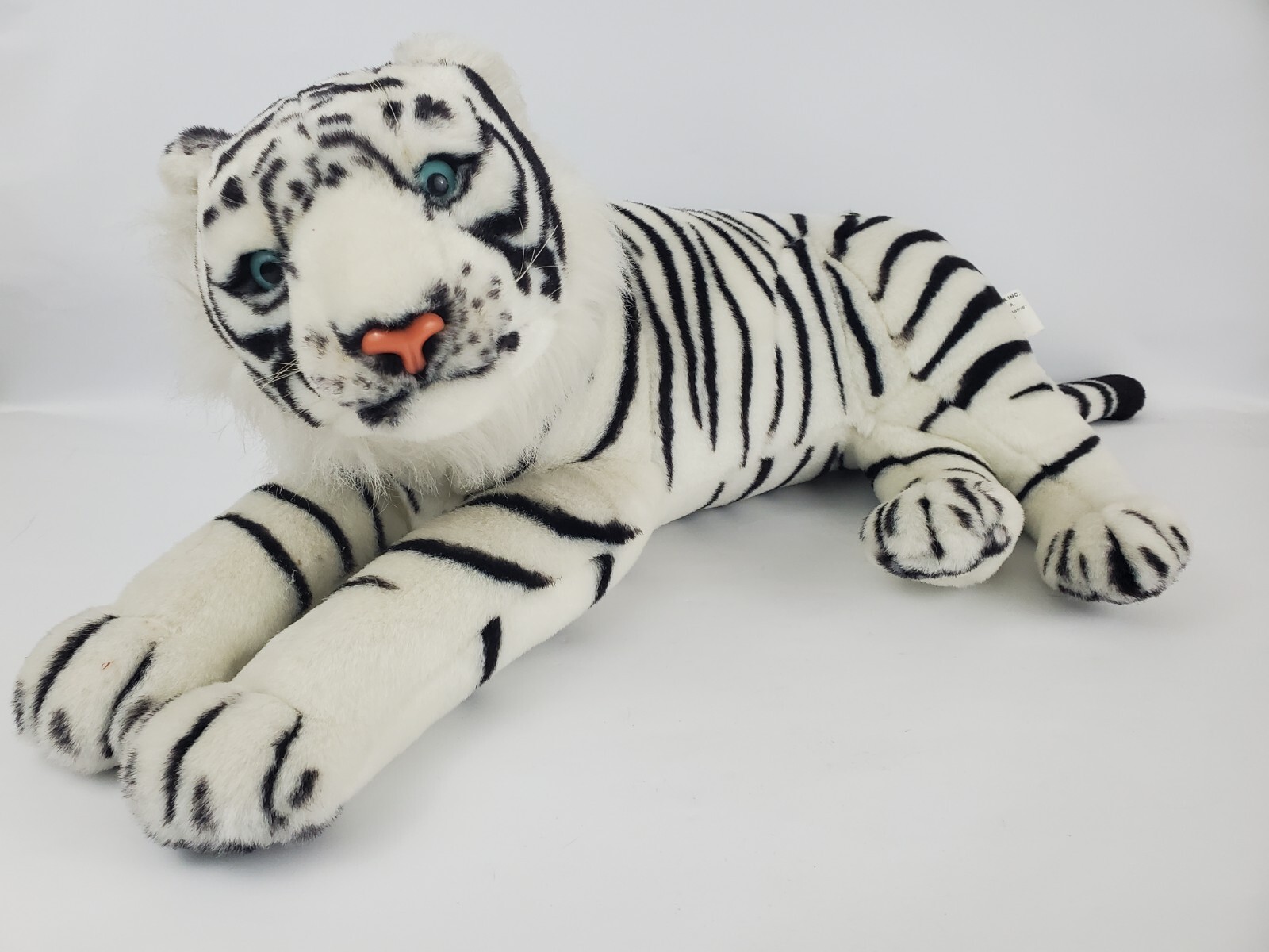 stuffed white tiger with blue eyes