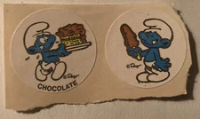 Vintage 1980’s Smurfs Chocolate scratch and sniff stickers 2 of them on backing