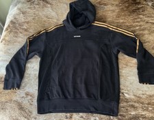 Sudadera con capucha IVY Park x Adidas 4ALL: negra con rayas doradas: Beyoncé: 9/20 mediana