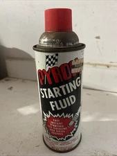Vintage PYROIL STARTING FLUID Can. Awesome Graphics. Checkered Flag. Spark Plug