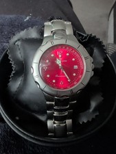 Claude Valentini Oceanmaster model. It features a red dial,