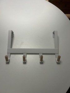 White MCM door hanger