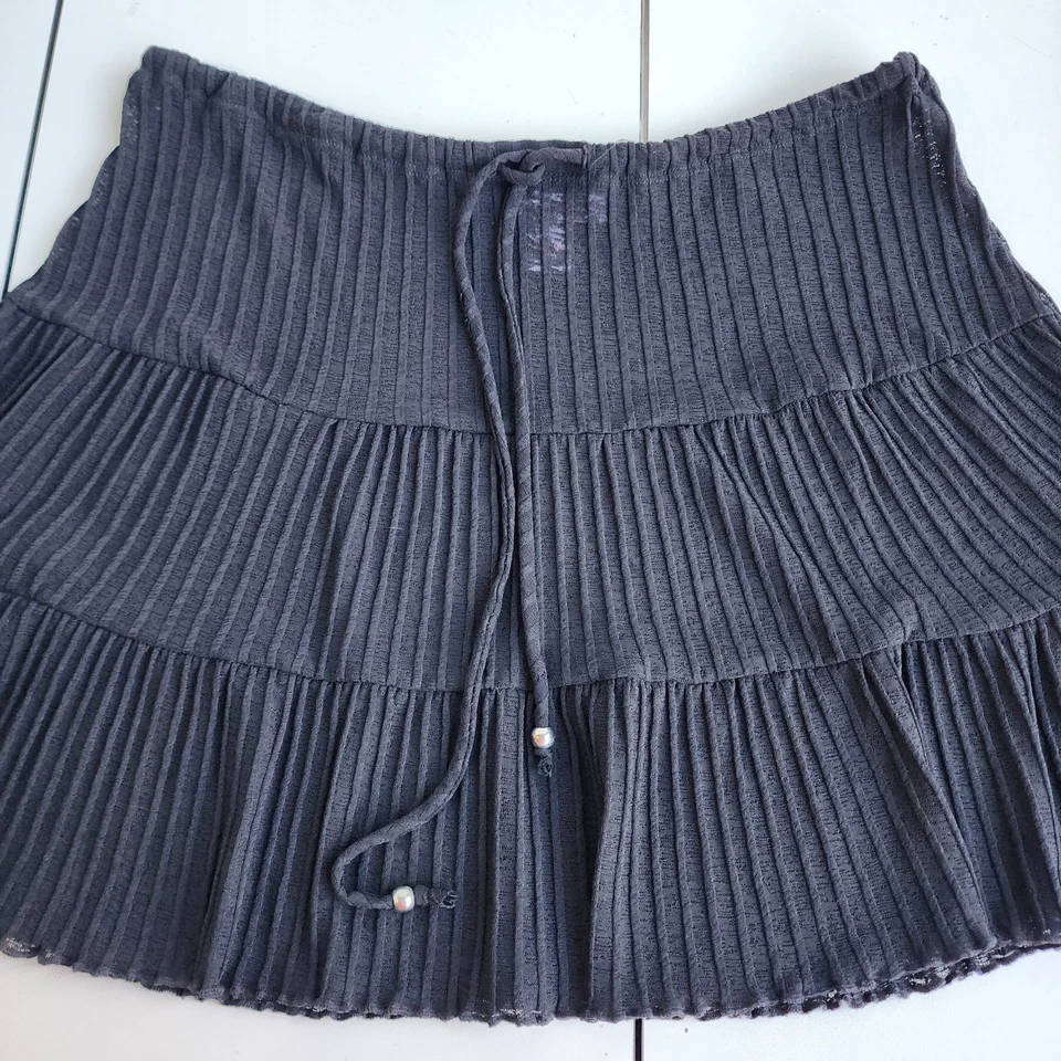 Mini traje de baño plisado elástico negro Ocean Pacific falda encubrimiento cordón talla L Foto 3 de 4