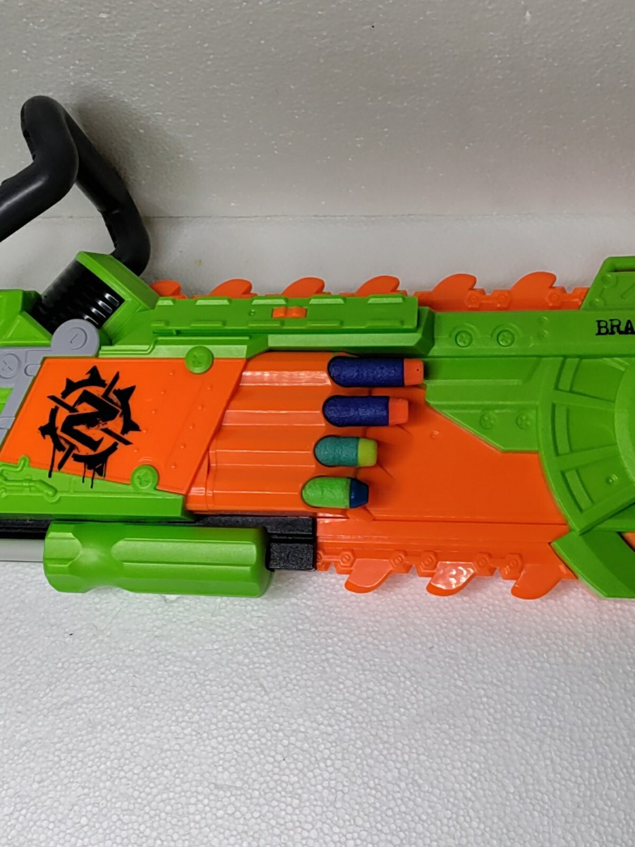 Nerf ZombieStrike Brainsaw Blaster Chainsaw Pump Action W/8 Ammo