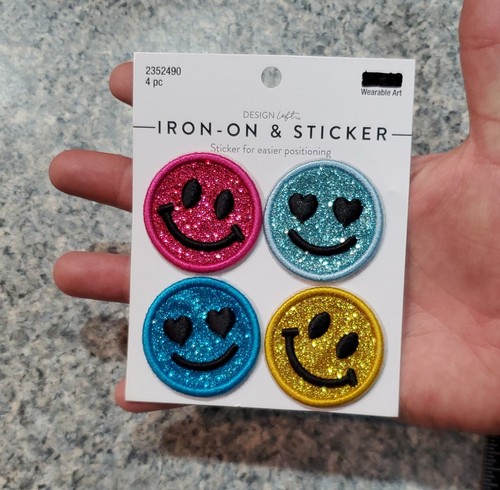 Toppe adesive e stirate con faccine sorridenti glitterate - Foto 3 di 4