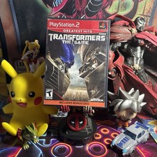 TRANSFORMERS THE GAME PS2 (PlayStation 2, 2007) Complete With Manual, Bonus Disc