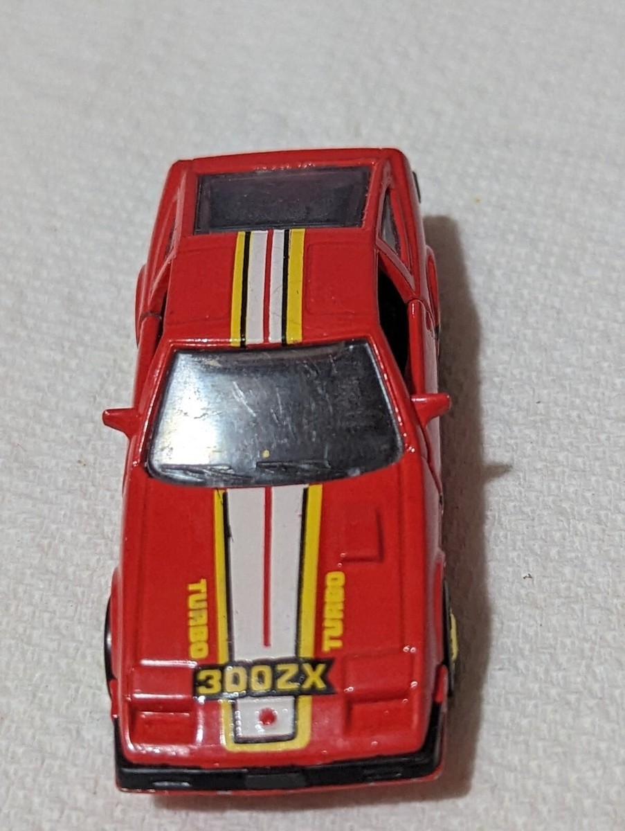 SLEEK NISSAN 300 ZX CAJUN SPICE RED/SUN YELLOW DOORS OPEN 1:64