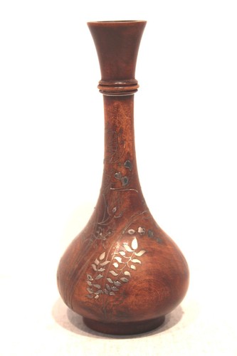 unique vintage wooden vase with custom sterling silver artwork.