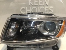 TYC 20-9530-00 NSF Certified L. Driver Headlight Fits 14-16 Jeep Grand Cherokee