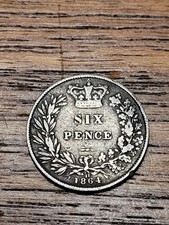 1864 Queen Victoria Silver Sixpence – Circulated Example (Bent Coin)