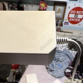 Wii Console Bundle with Wii Sports, Remote, Nunchuk, Sensor Bar, Travel Bag