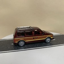 Auto World Mighty Minivans 1984 Dodge Caravan Dark Red Burgundy w/Wood Panel NM