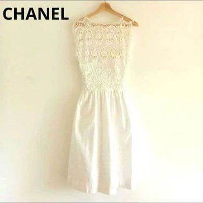 Robe CHANEL 38 perles de fleurs en tweed longueur genou 78 cm occasion - Photo 1/4