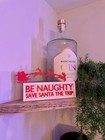 Be Naughty Save Santa The Trip Sign – Funny Christmas Plastic Decoration 20cm