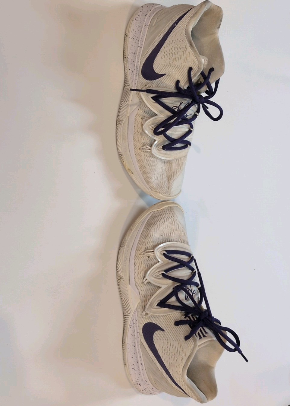 In A White Colorway With Purple Laces Size 7