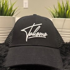 Black takomo trucker hat with