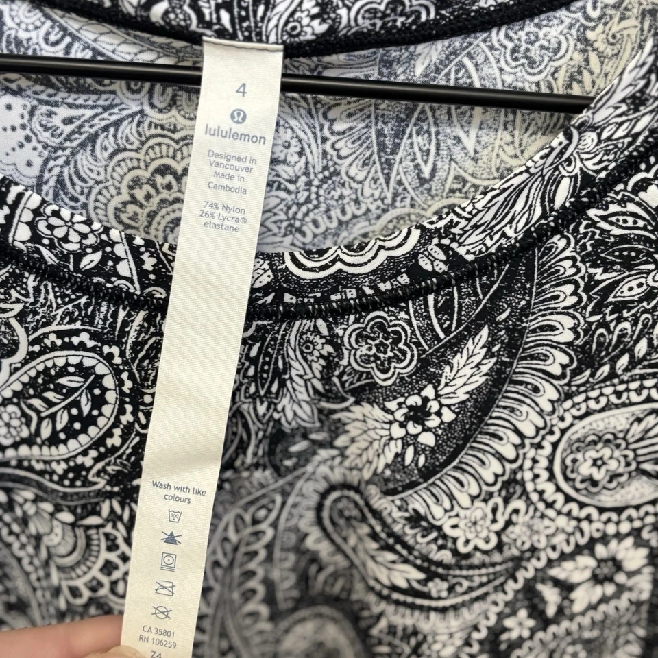 Camiseta sin mangas de entrenamiento Lululemon para mujer talla 4 cachemir suela blanca y negra nueva sin etiquetas Foto 3 de 4
