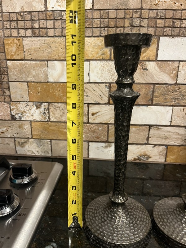 Pair of 11” hammered metal candlesticks weighing 2.2 lbs in total