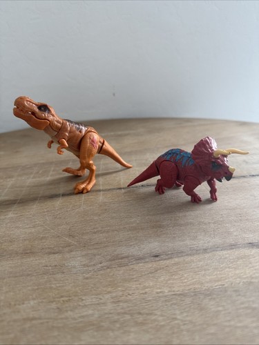 Lot of 2 Dinosaurs Moveable Heads Tails