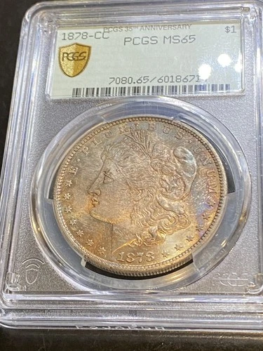 1878cc MORGAN SILVER DOLLAR PCGS MS65. OBVERSE IS NICELY TONED NICE LOOKING COIN